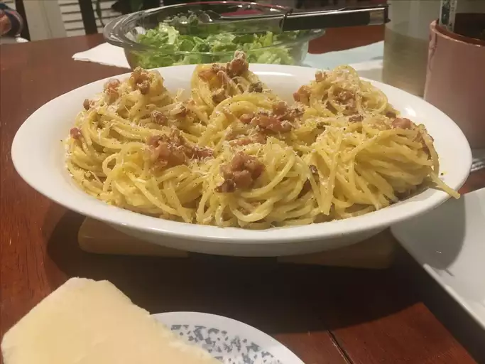 Creamy pasta tossed in a light Parmesan sauce